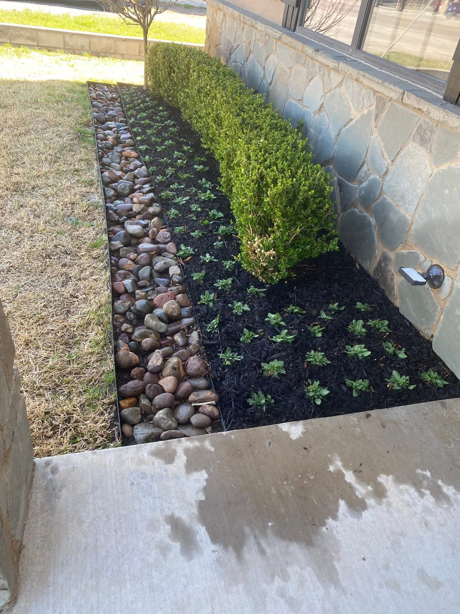 Rock and mulch flower bed installation — Prestige Lawn & Landscaping